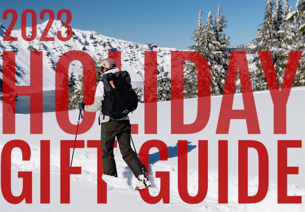 Image says 2023 Holiday Gift Guide and shows a Skier wearing a ULA Pack in the snow.