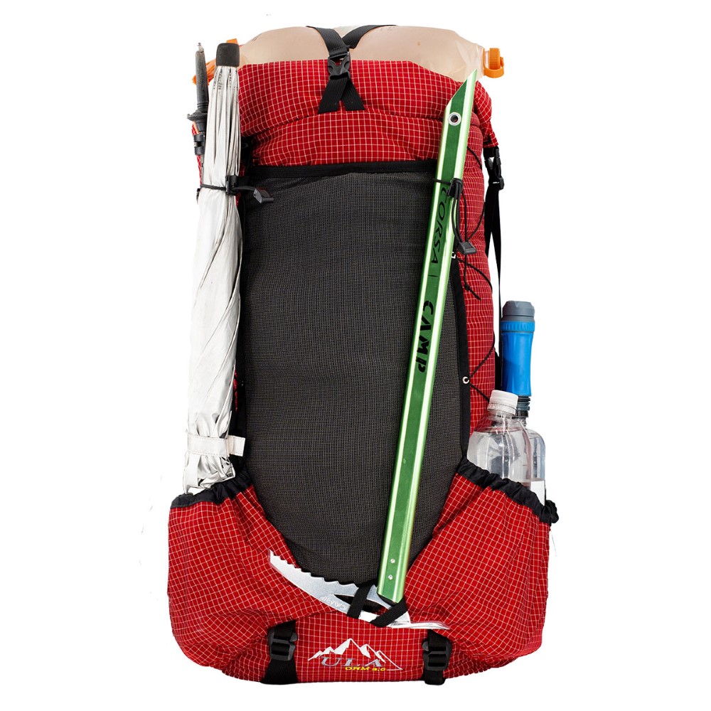 ULA 2024 Ohm: With Top Y-Strap and Bottom Straps Attached. Pack is fully loaded with gear in the side pockets, under the top Y-strap, and in the front cinch cord.