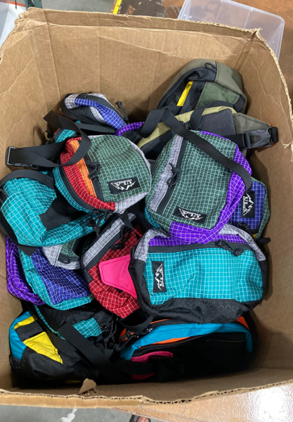 A box full of recently finished Entropy Spare Tire's.