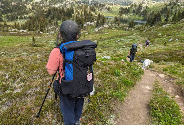 A super cute little kid wears his XS Circuit during an alpine expedition.