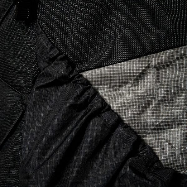 The stretchy side pocket detail on the Nexus backpack.