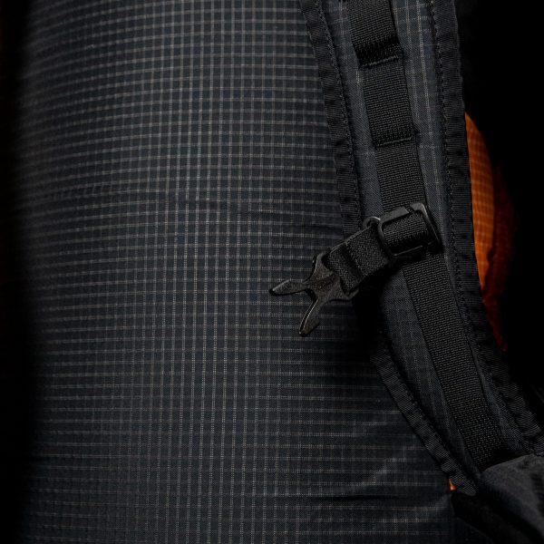 A close up of the female bucket clip side of a sternum strap on the ULA Nexus backpack