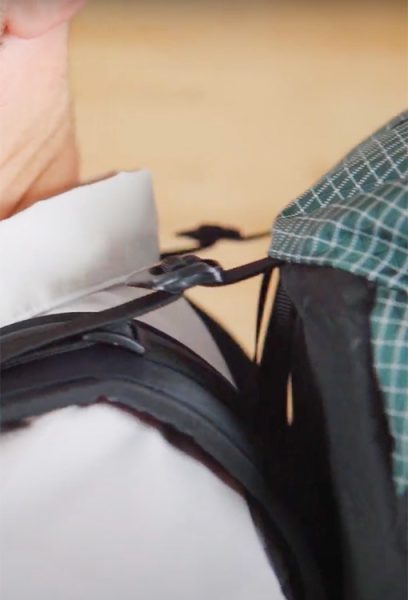 An upclose view of the load lifter straps connecting the top of the pack to the shoulder straps. The load lifters straps are tight, but not overly, and create a nice, straight line from strap to pack.