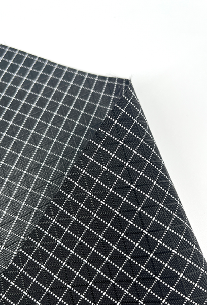 A close up view of the black robic back and front. They look pretty similar and have a subtle black diamond pattern and a white grid patter over top.