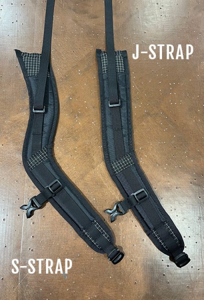 An image showing the difference between the S-strap and J-strap shoulder strap options. The S-strap is curvier, and the J-strap is straighterr.