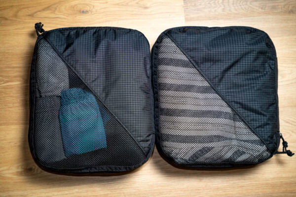 A 30L Packing Cube Bundle of 2 large cubes sitting side by side. They are fully packed.