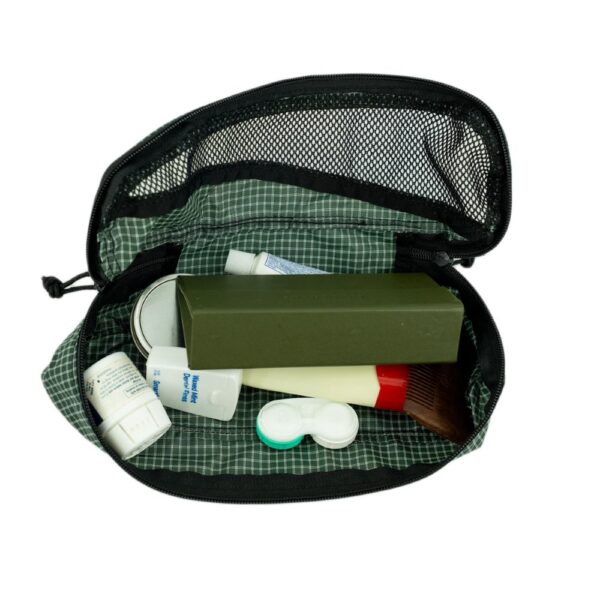 ULA Small Packing Cube in ULA Green. Cube holds a handful of toiletries.