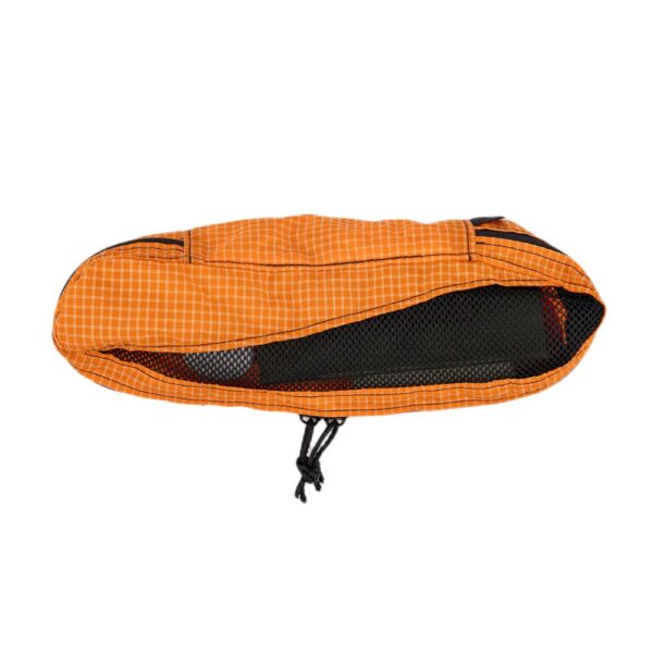 ULA Small Packing Cube in Tangerine. Cube holds a handful of toiletries.