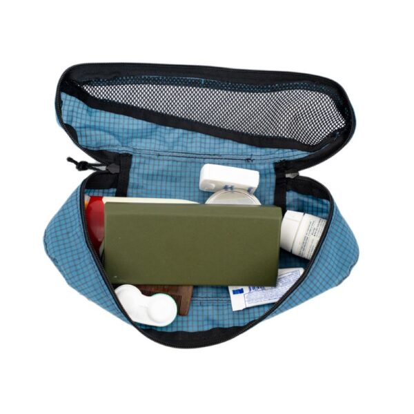ULA Small Packing Cube in Smoke Blue. Cube holds a handful of toiletries.