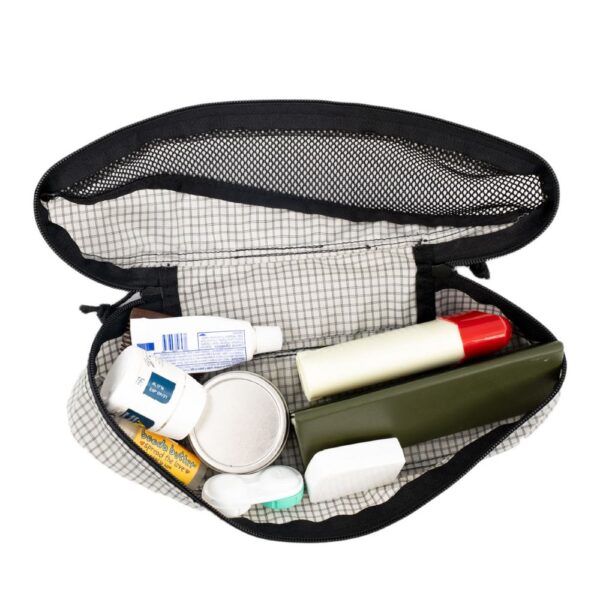 ULA Small Packing Cube in Silverado Cube holds a handful of toiletries.