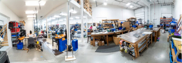 A fisheye panoramic view of the ULA shop showing our manufacturing floor.