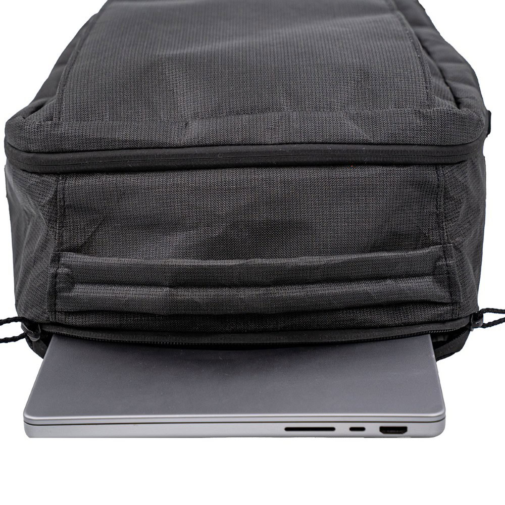 ULTRA Cicada Daypack laptop sleeve with laptop sticking out