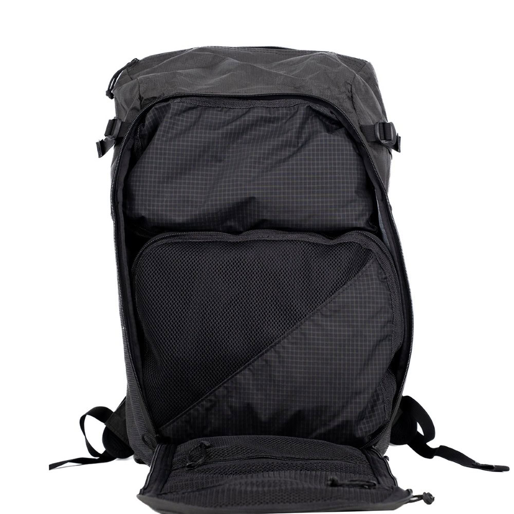 A 2 Large + 1 Shoe Cube Bundle in a 36L Dragonfly Backpack. Everything fits neatly.