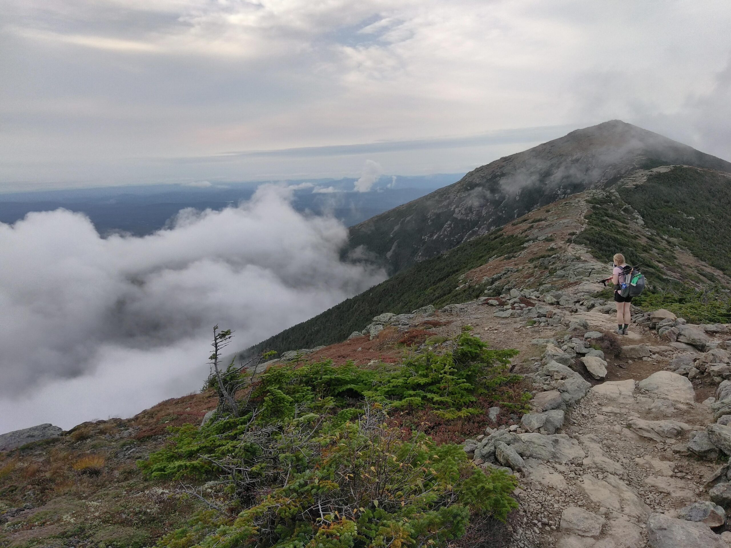 A woman hiking on Franconia Ridge